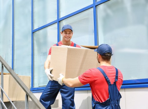 Packing and loading household items for a Greenwich move
