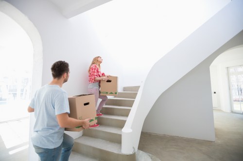 Furniture and IT items being loaded for a Greenwich business relocation
